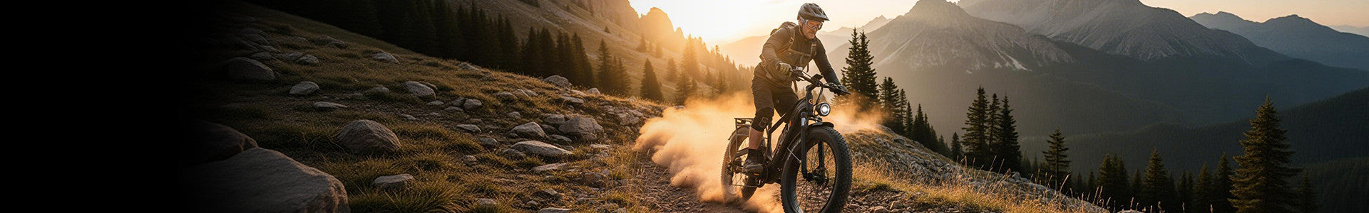 Jasion off road electric bike rider charging down rocky mountain trail at sunset, fat-tire ebike built for rugged terrain