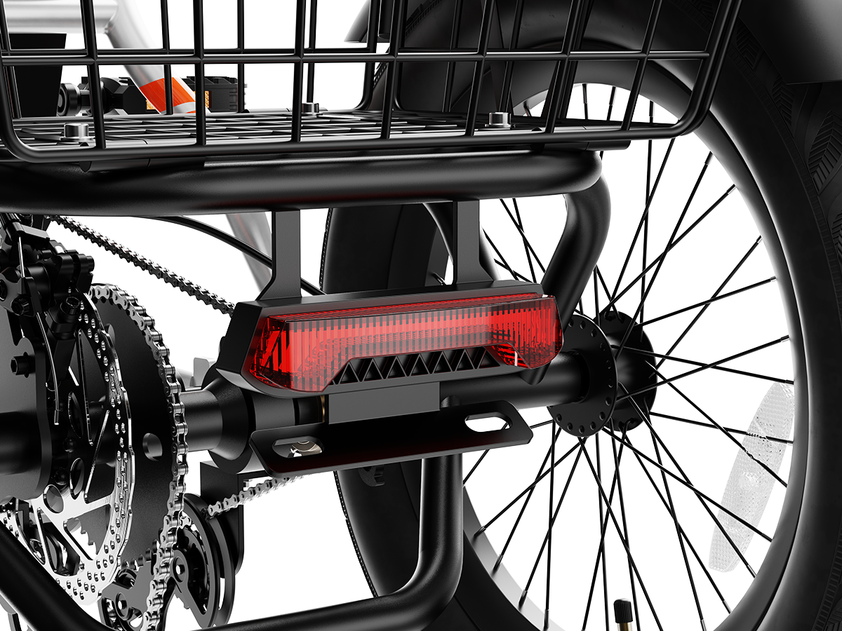 Rear taillight mounted under the cargo basket on an electric tricycle for adults